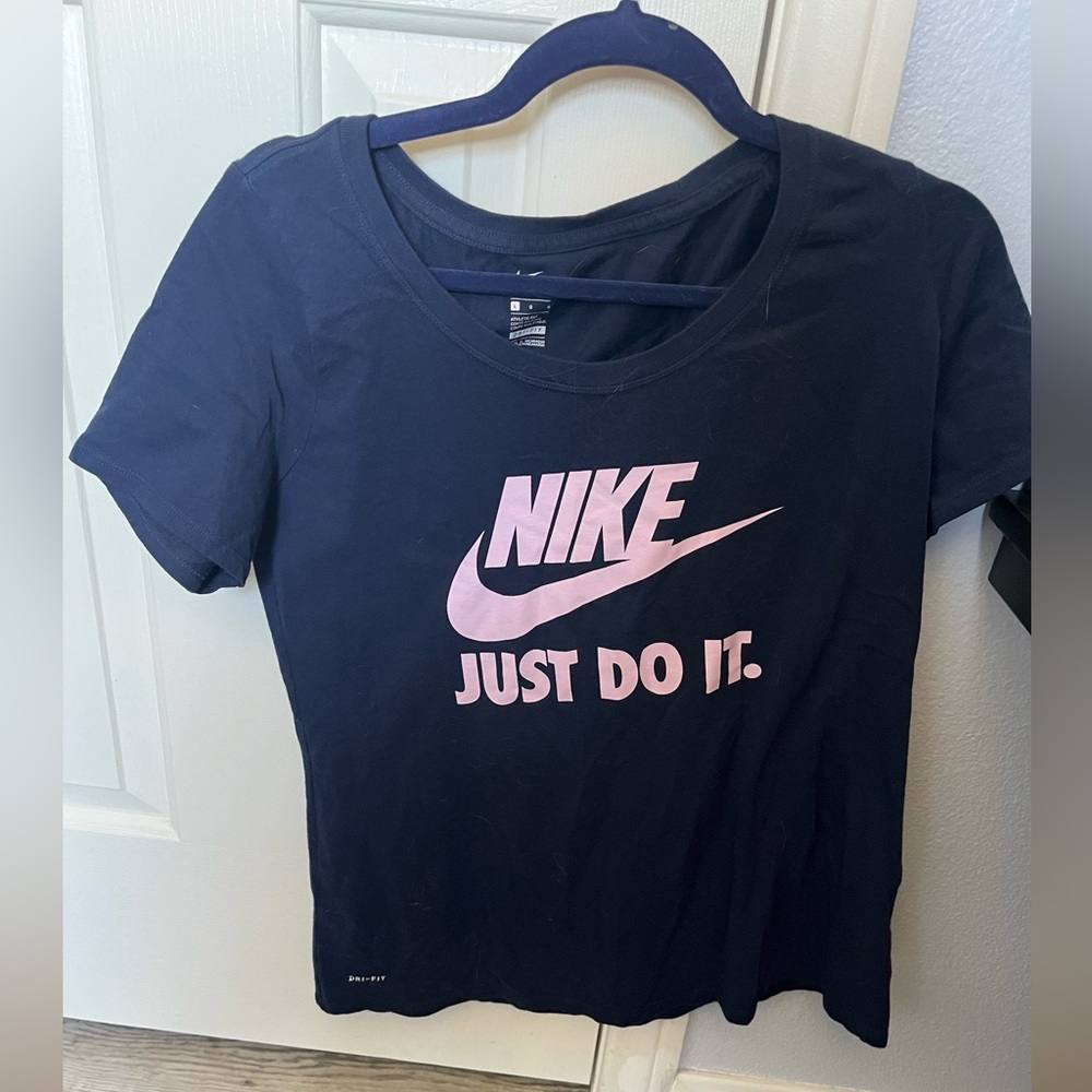 Woman’s Nike blue with pink Just do it Swoosh size L dry fit